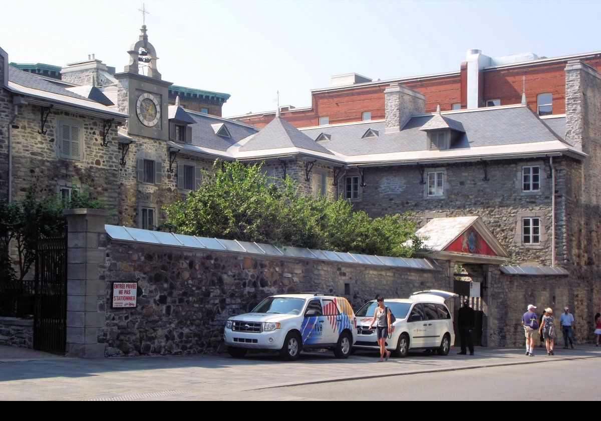 Old Saint-Sulpice Seminary.  Built between 1684 & 1687, Saint-Sulpice Seminary is the oldest building in Montreal, and is next to Notre-Dame Basilica.  The central clock dates to 1701 and is the oldest of its type in North America.