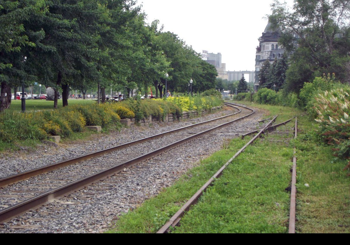 Old railway lines runnng alongside the Rue de la Commune Ouest.