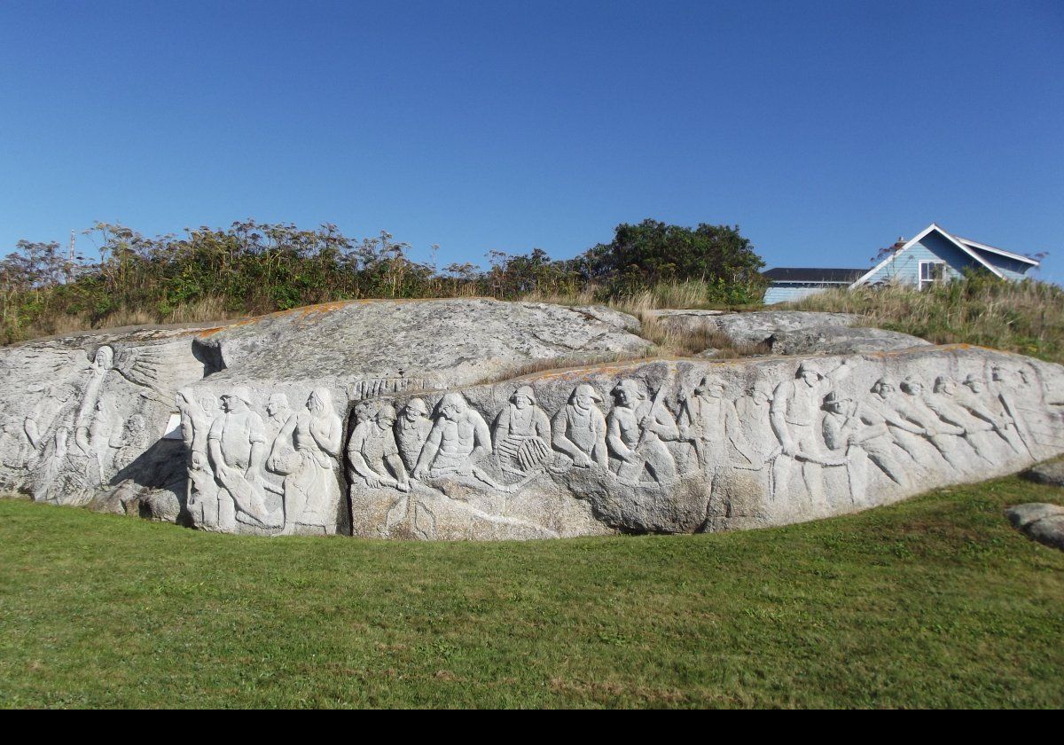 We did a trip out to Peggy's Cove while visiting Halifax, Nova Scotia. This sculpture by William Edward deGarthe called “Fisherman’s Monument” was sculpted out of a 100 foot granite face of rock found near his home. It includes thirty-two fishermen with their wives and children and the figure of Saint Erasmus of Formia, also known as Saint Elmo, the patron saint of sailors.