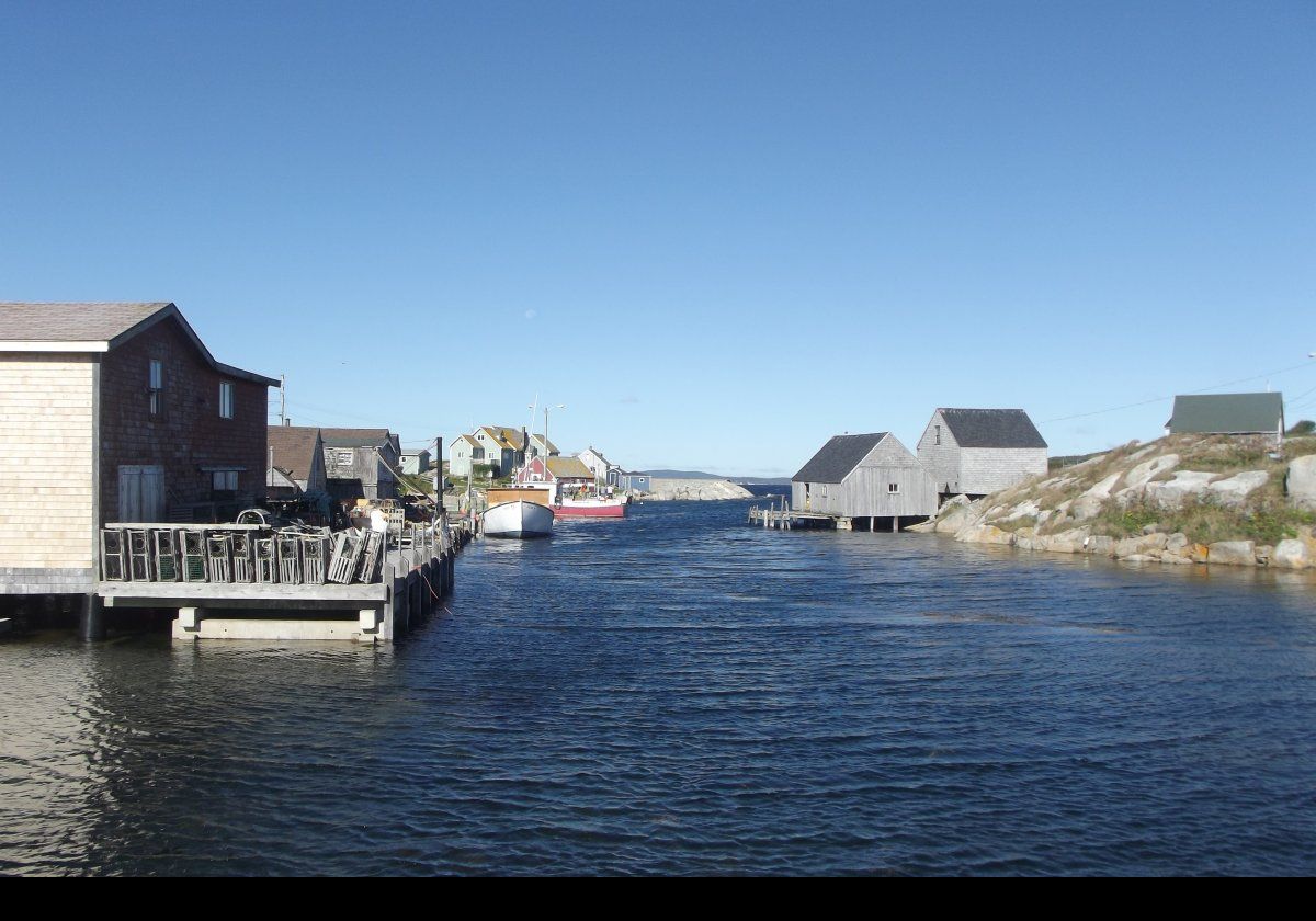 Looking across Peggy's Cove with the "Bouy Shop", a souvenir store, on the left.