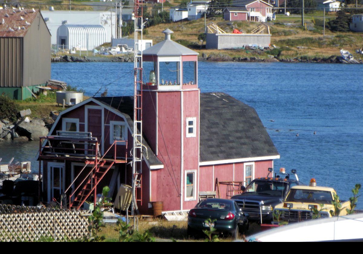 This appears to be someone's home rather than a real lighthouse; however, it has what looks like a genuine optic at the top.