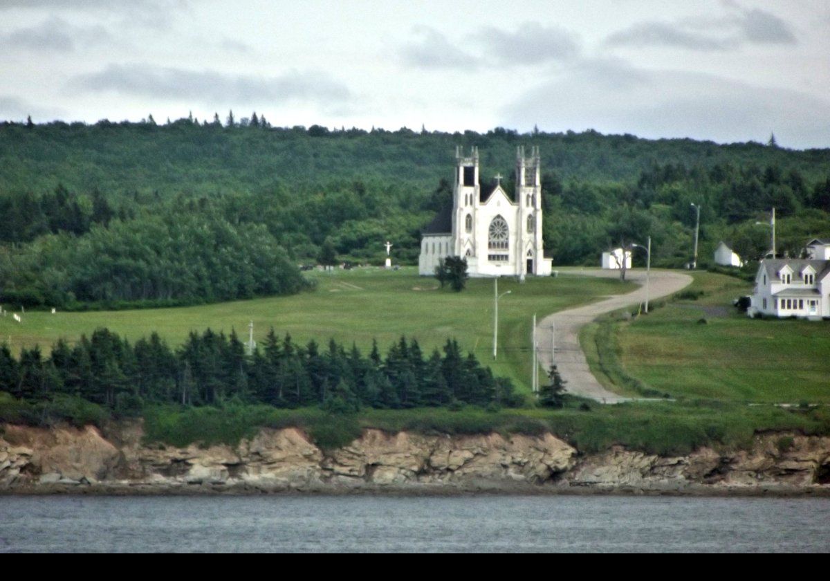 St. Alphonsus Church Known as the Stone Church.  Constructed in 1916, the Diocese of Antigonish closed it in 2007 as it would cost over $600,000 to restore.  Local groups are hoping to buy and restore it.  Click the image for more information; opens on a new page.  