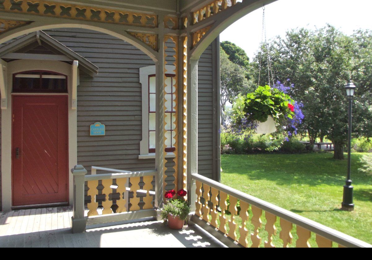 The end of the porch adjacent to the carriage house.