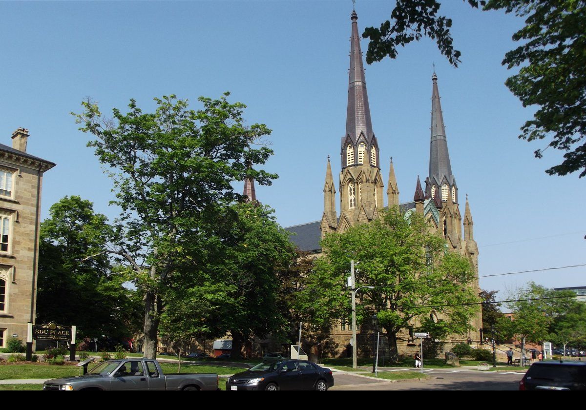 St. Dunstan's Basilica is the fourth church on this site.  The third building was destroyed by fire in 1913, and the current church rebuilt on the site, and completed in 1916.  It is also Charlottetown Roman Catholic Cathedral.  Click the image to see a commemorative plaque.