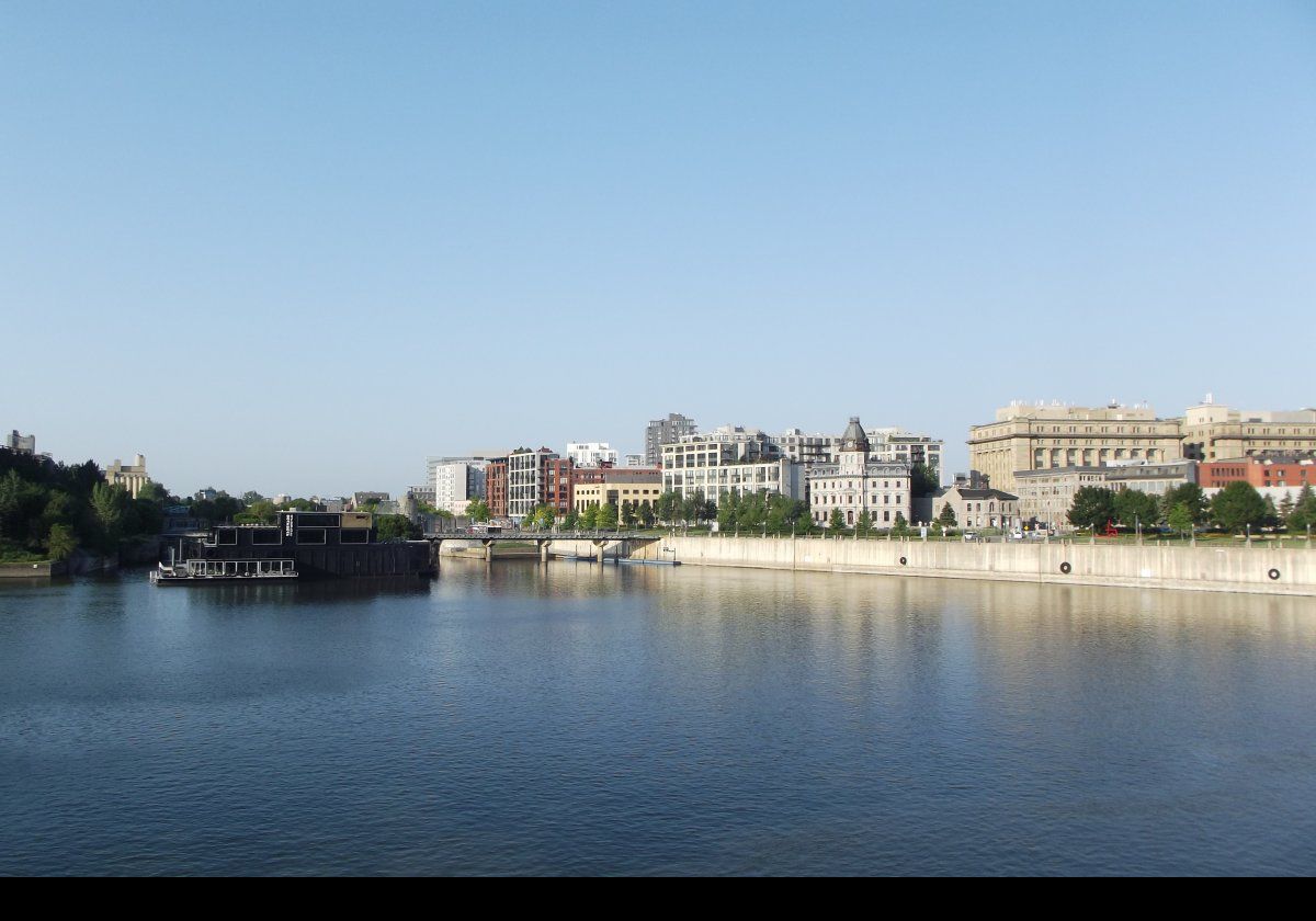 Heading into Montreal Harbor.  Right of center (gray dome) is the Harbour Commissioners Building.