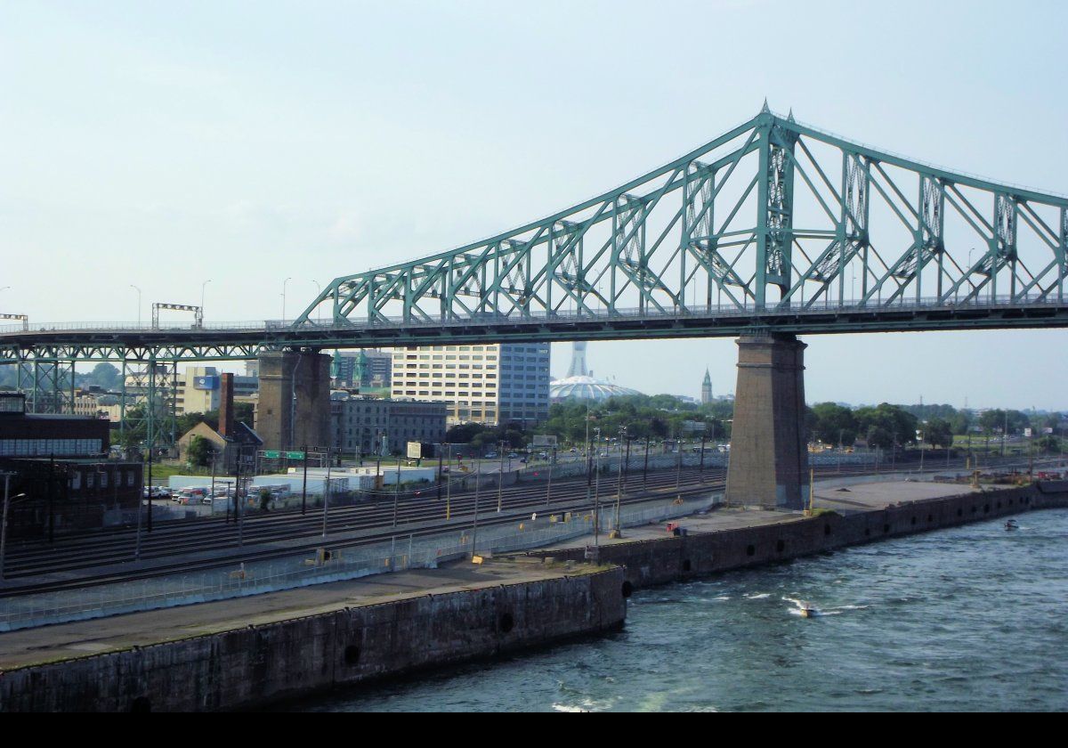 The Jacques Cartier Bridge crosses the Saint Lawrence River from Montreal via Saint Helen's Island to Longueuil on the eastern bank.  Constructed between 1925 & 1930, it was called the Montreal Harbour Bridge (pont du Havre) when it opened, but that was changed in 1934.  Jacques Cartier was the first explorer to travel up the St Lawrence, and came to Hochelaga (now Lachine; a borough of Montreal), in October, 1535.