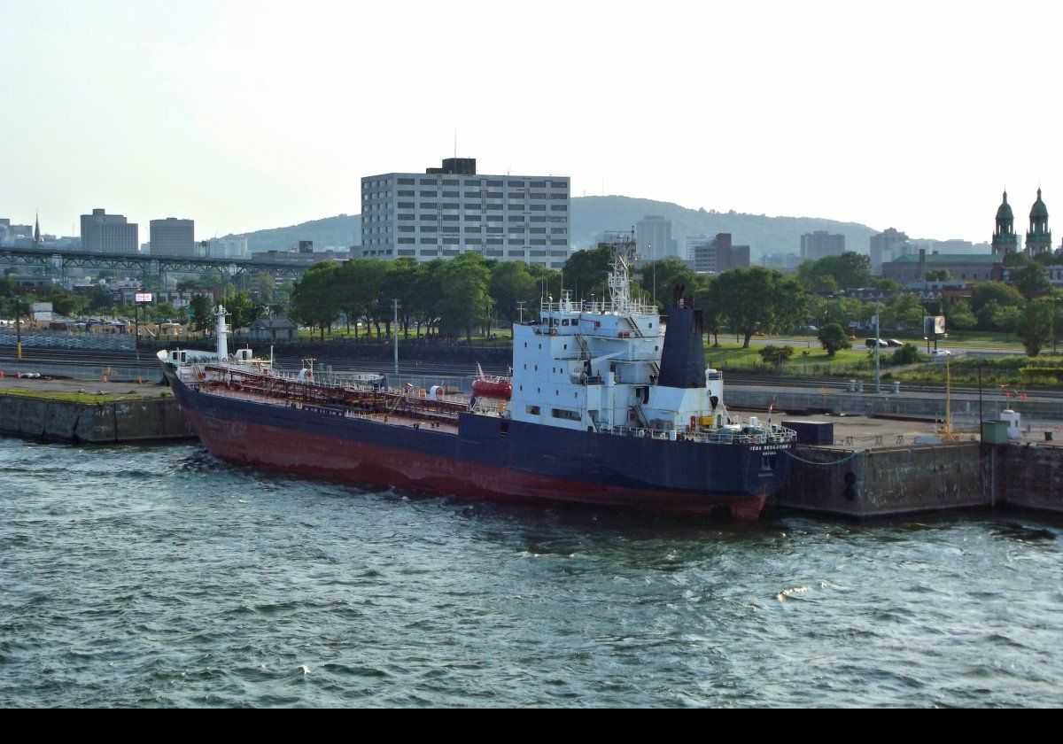 Commercial vessels moored along the various berths in the port.