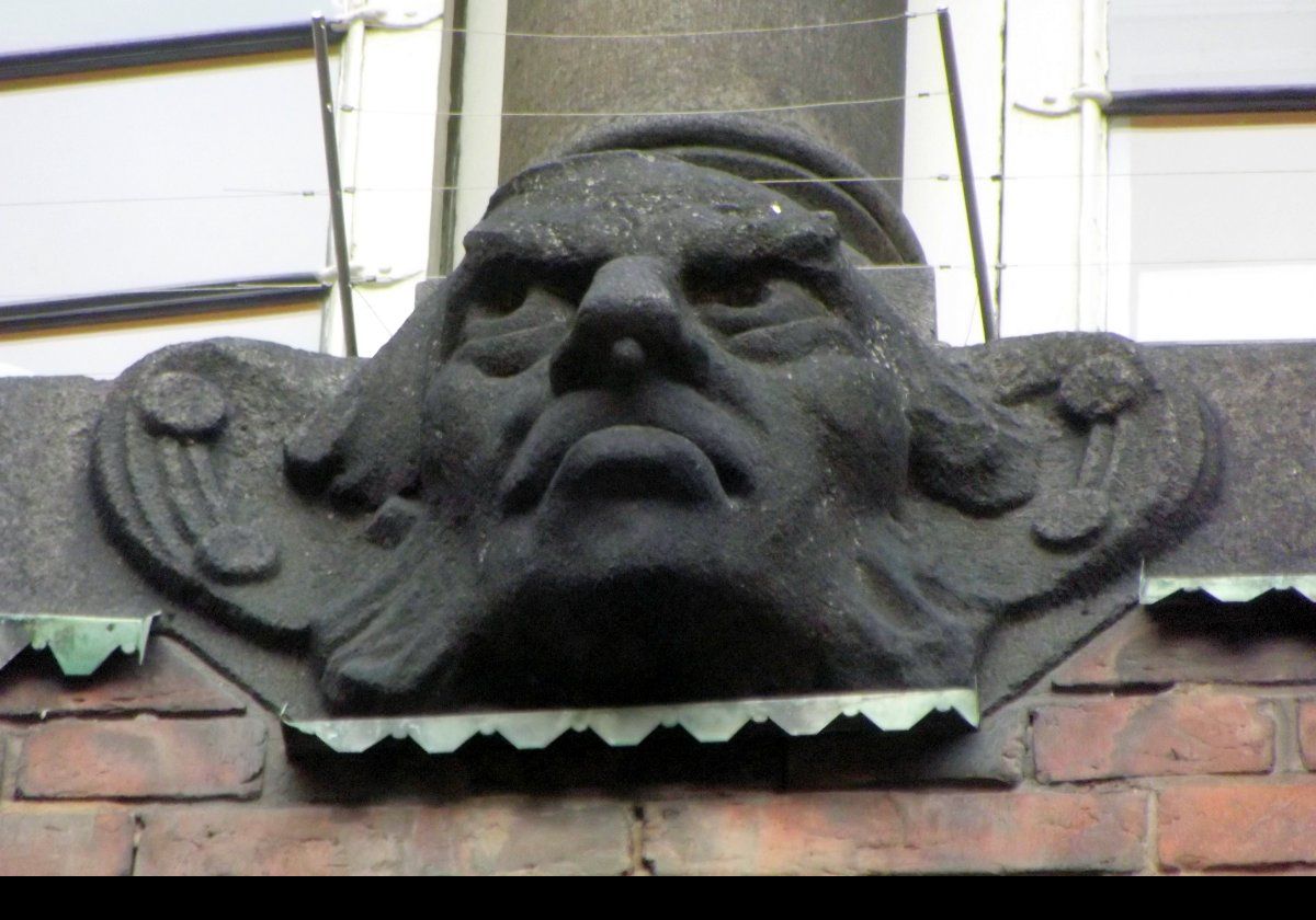 One of a number of gargoyles on the facades of the City Hall complex.