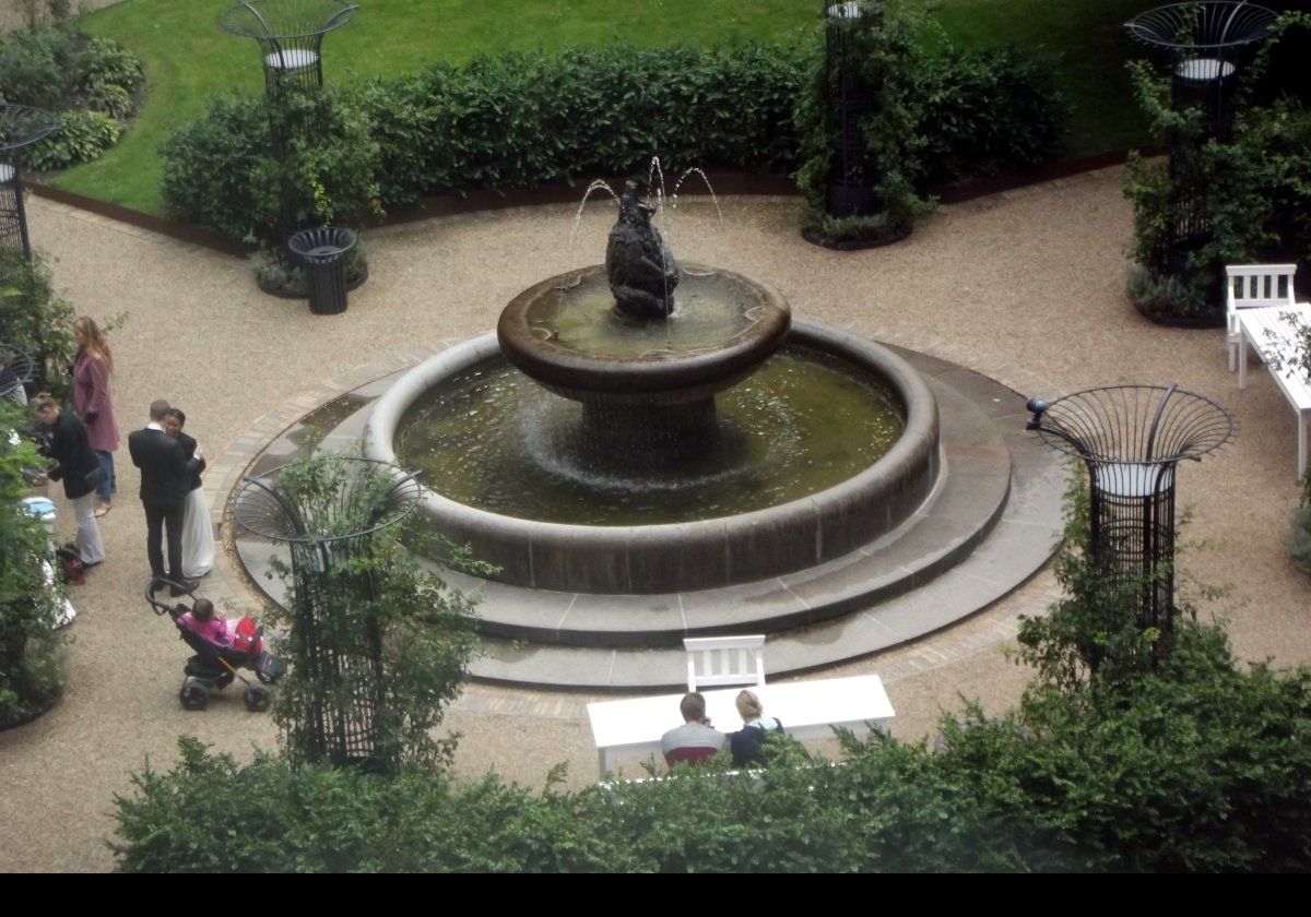 The Bear Fountain in the Copenhagen city hall garden. Erected here in 1900, and created by two sculptors Joakim Skovgaard & Thorvald Bindesbøll in 1888, the bear appears to be trying to catch the water.