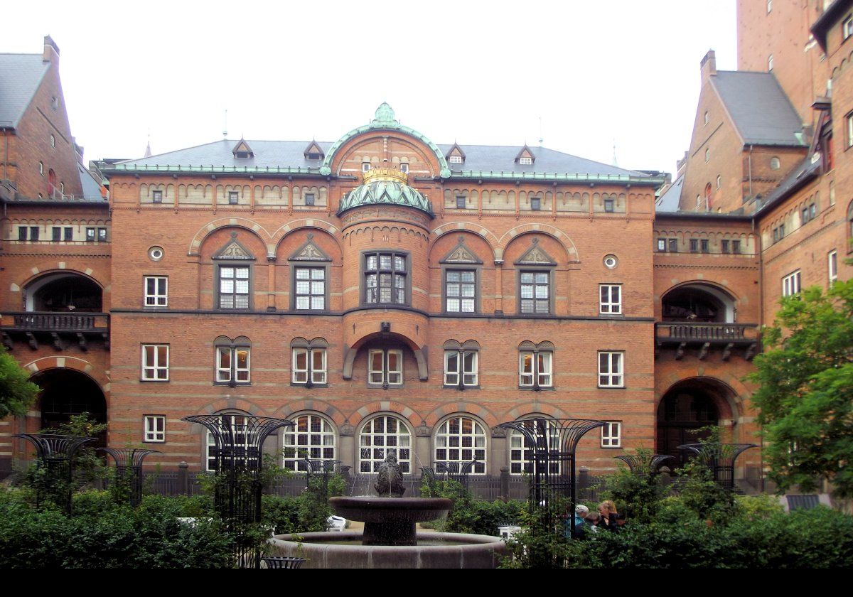 At ground level in the inner courtyard with the Bear Fountain in the foreground.