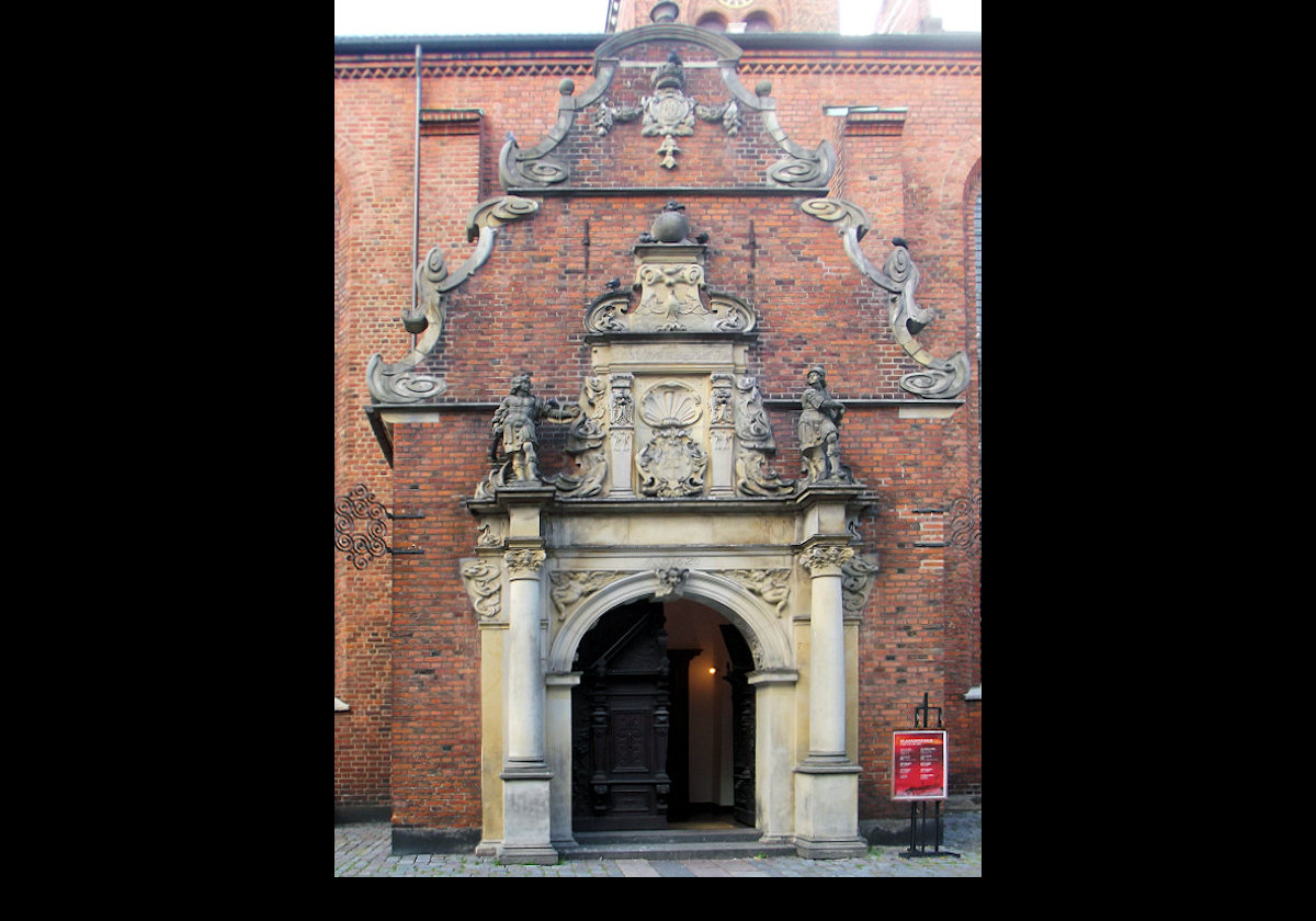 The entrance to the Church of the Holy Spirit, Helligåndskirken in Danish. It is one of the oldest churches in the city. The original church dated back to the 13th century. The Copenhagen fire in 1728 destroyed the church, and the current church dates to 1732.