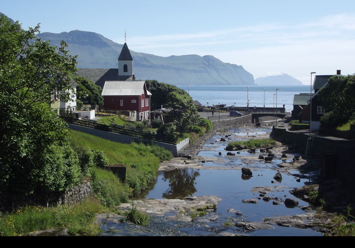 The stream that runs through the village of Leynar from the lake called Leynavatn (Lake Leynar), about 1 mile/1.6 km north-east of the village.