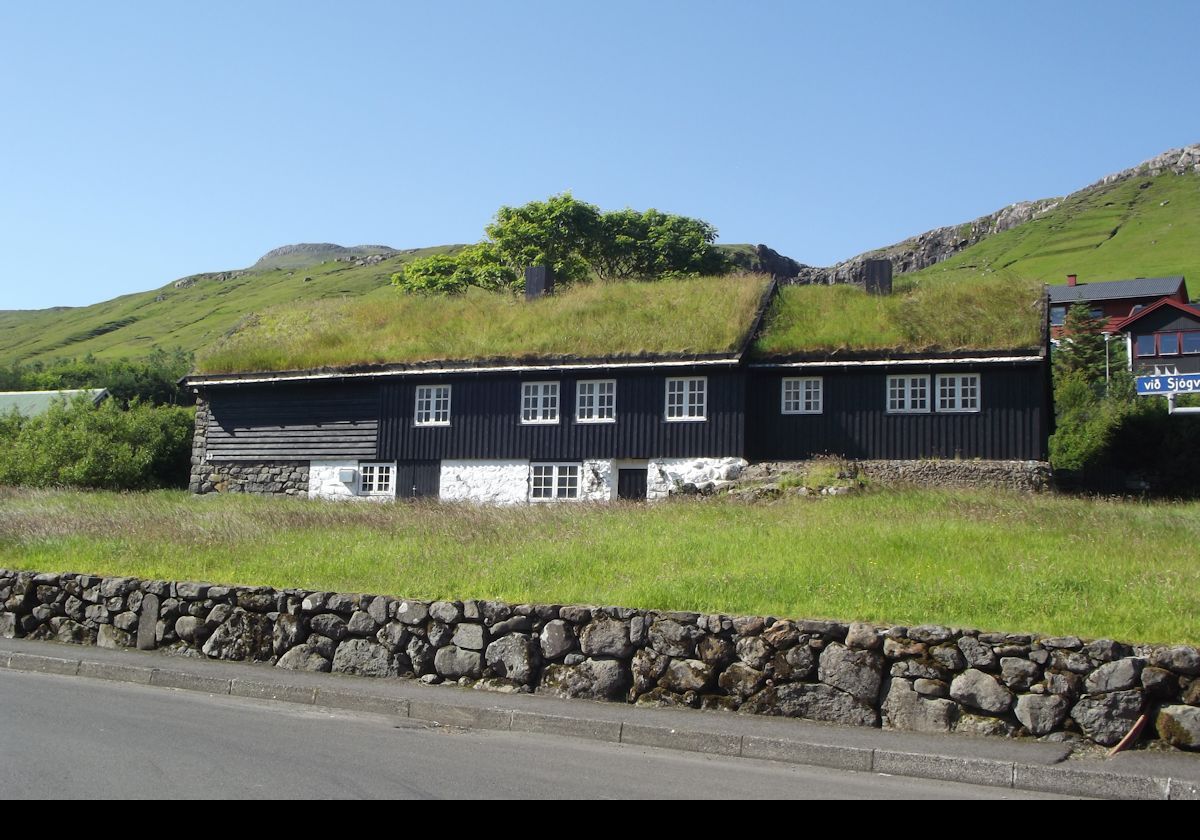 Arriving in the village of Kollafjørður. It lies along the fjord of the same name. Leynar is about 10.5 km/6.5 miles away.