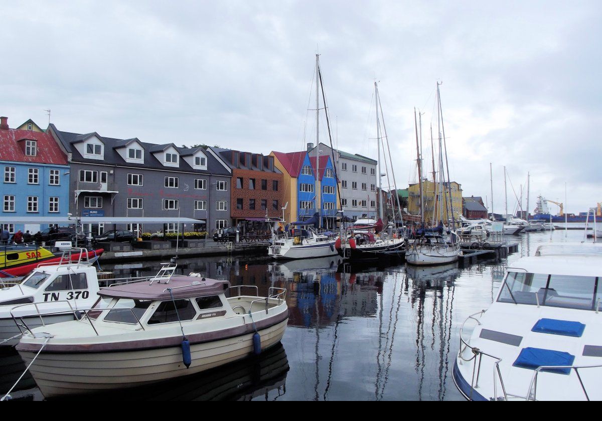 The marina with some of the historic buildings in the Tinganes district.