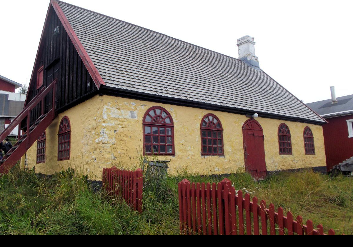 Built around 1871, this is one of the oldest houses in Qaqortoq. Originally a blacksmith's workshop, it now houses the Muku & Aja Shops.