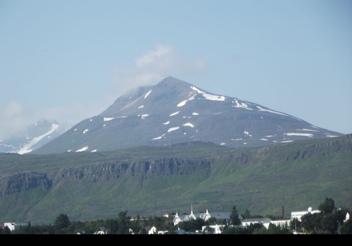 A mountain towering over the town.