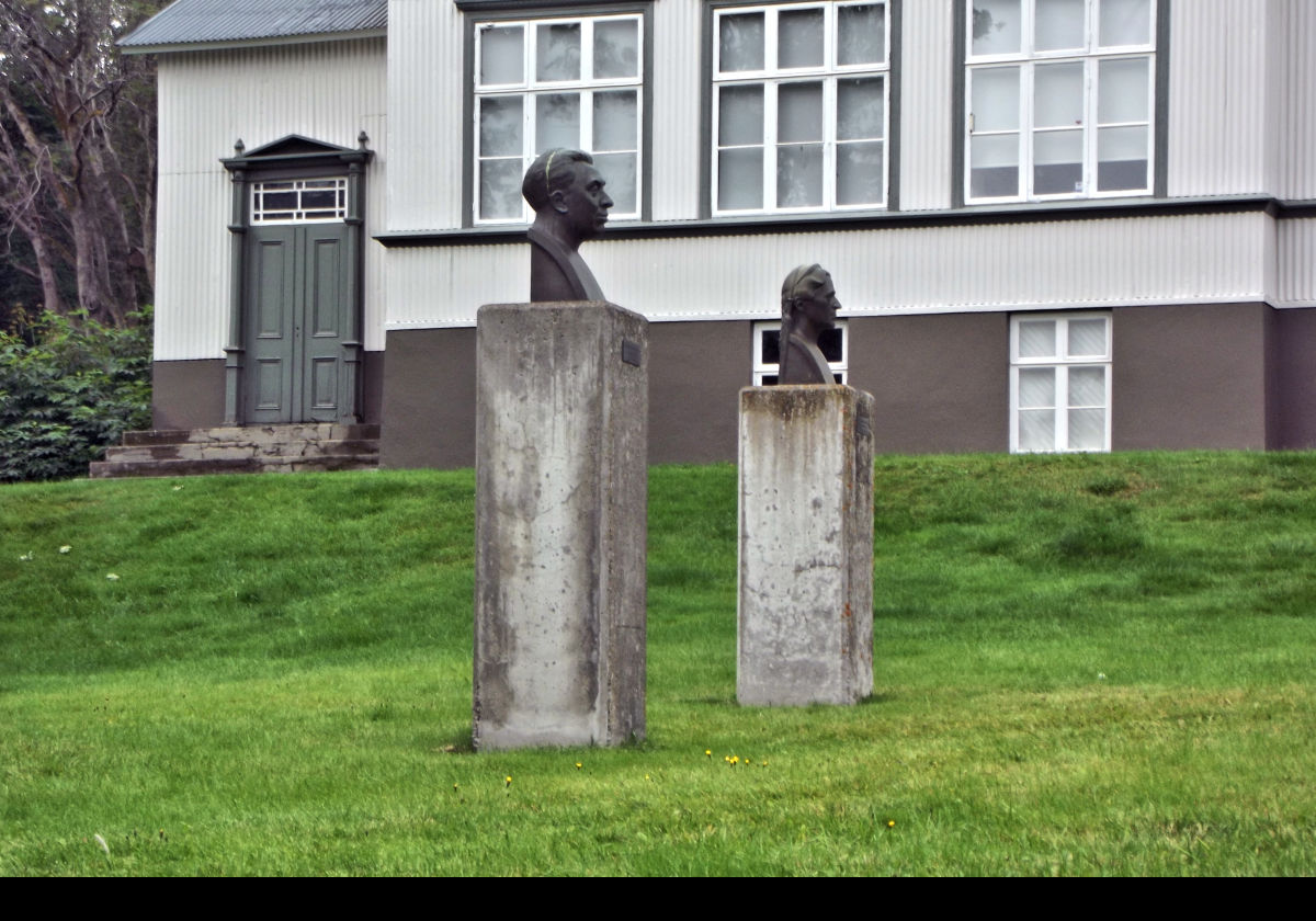 Two heads located outside of the Akureyri Junior College. I have been unable to identify who they are.