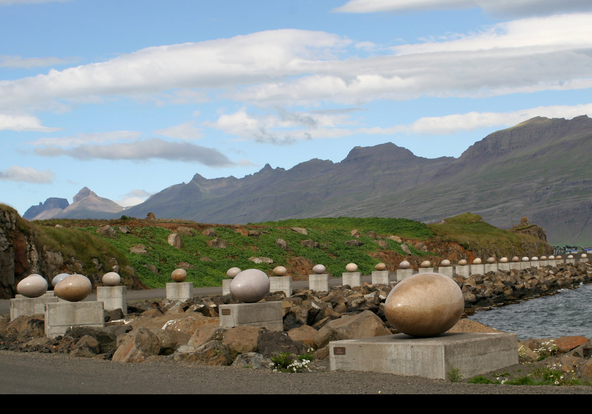 Eggin i Gleoivik - the Eggs of Merry Bay.  By Sigurður Guðmundsson, the work is a replica of the eggs of 34 nesting birds in the area.  Image by Ira Goldstein.  https://commons.wikimedia.org/wiki/File:Eggin_%C3%AD_Gle%C3%B0iv%C3%ADk.jpg.