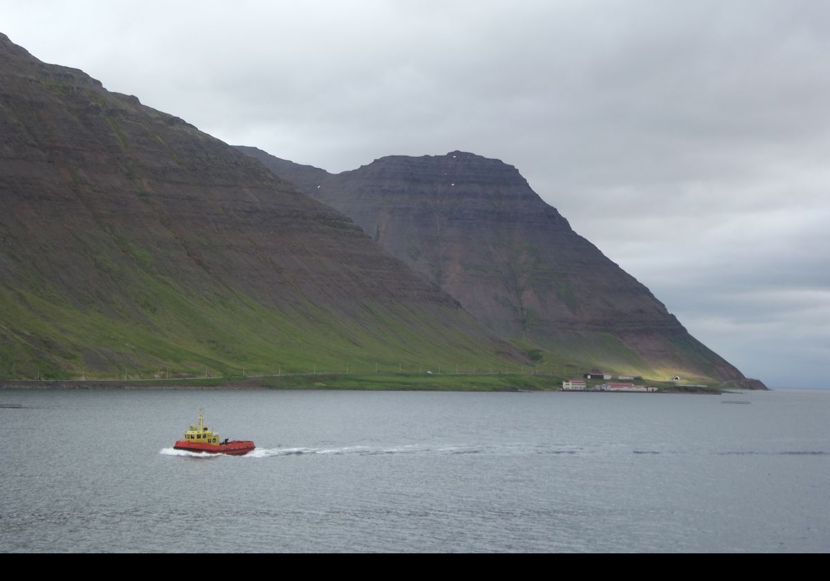 Iceland is relatively young, with the oldest parts, in the east and west, being only a few million years old. Compare this to Alaska which dates back at least 65 million years. This is the small village of Hnífsdalur, about 4 km (2.5 miles) north of Isafjordur.