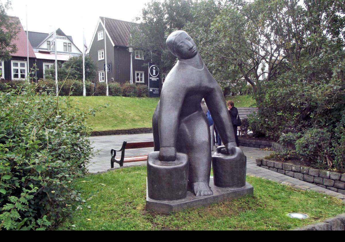 This statue, sculpted by Ásmundur Sveinsson, represents a woman carrying two buckets of water. It is called the Water Carrier (or “Vatnsberinn”). When presented to the city of Reykjavík in 1948 it was very controvertial as many people considered it very ugly.