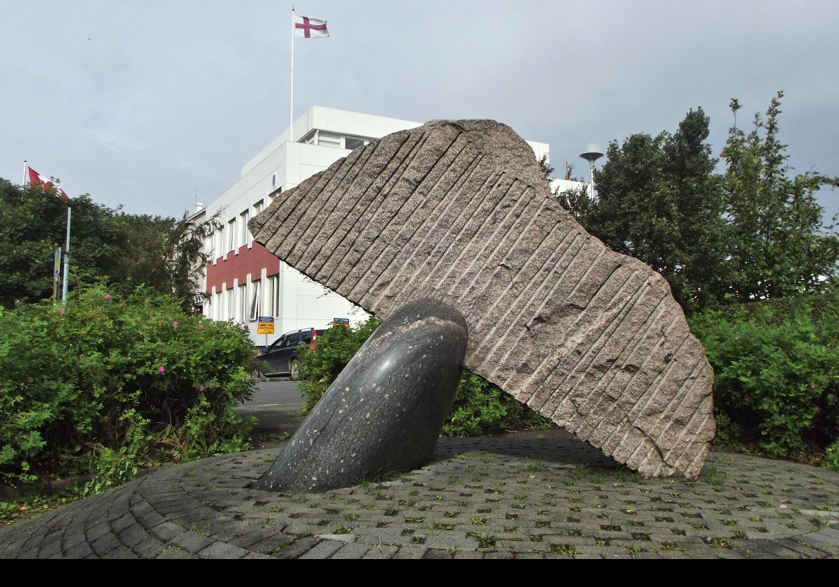 Whale tail sculpture given to Iceland by the people of Latvia in gratitude for Iceland's recognition of an independent Latvia. The inscription states: “We are a small nation. / We shall be as great / As is our will”.