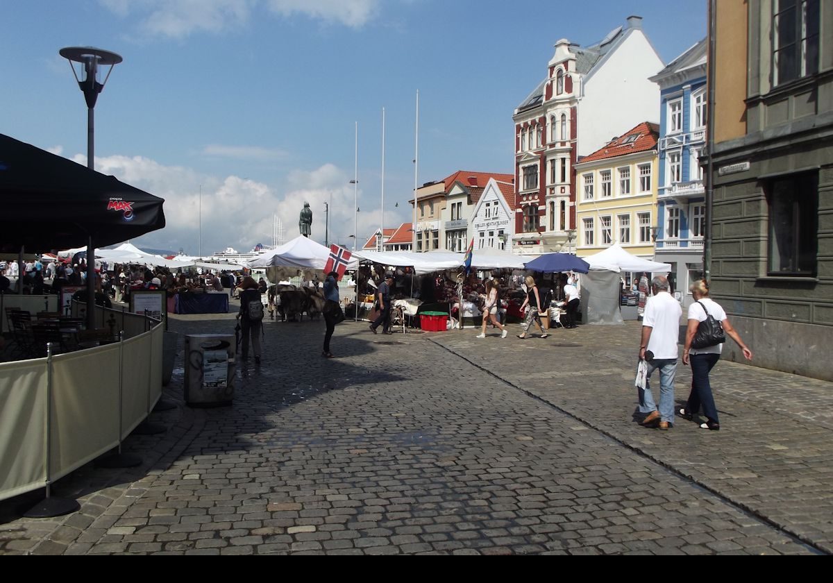 Looking across Vågsallmenningen, a plaza in Bergen, towards the statue of Ludvig Holberg in the distance.