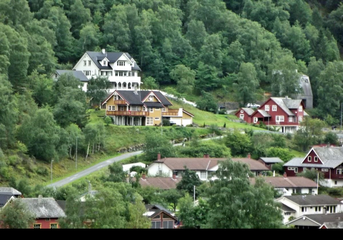 Homes rising up the hillsides.