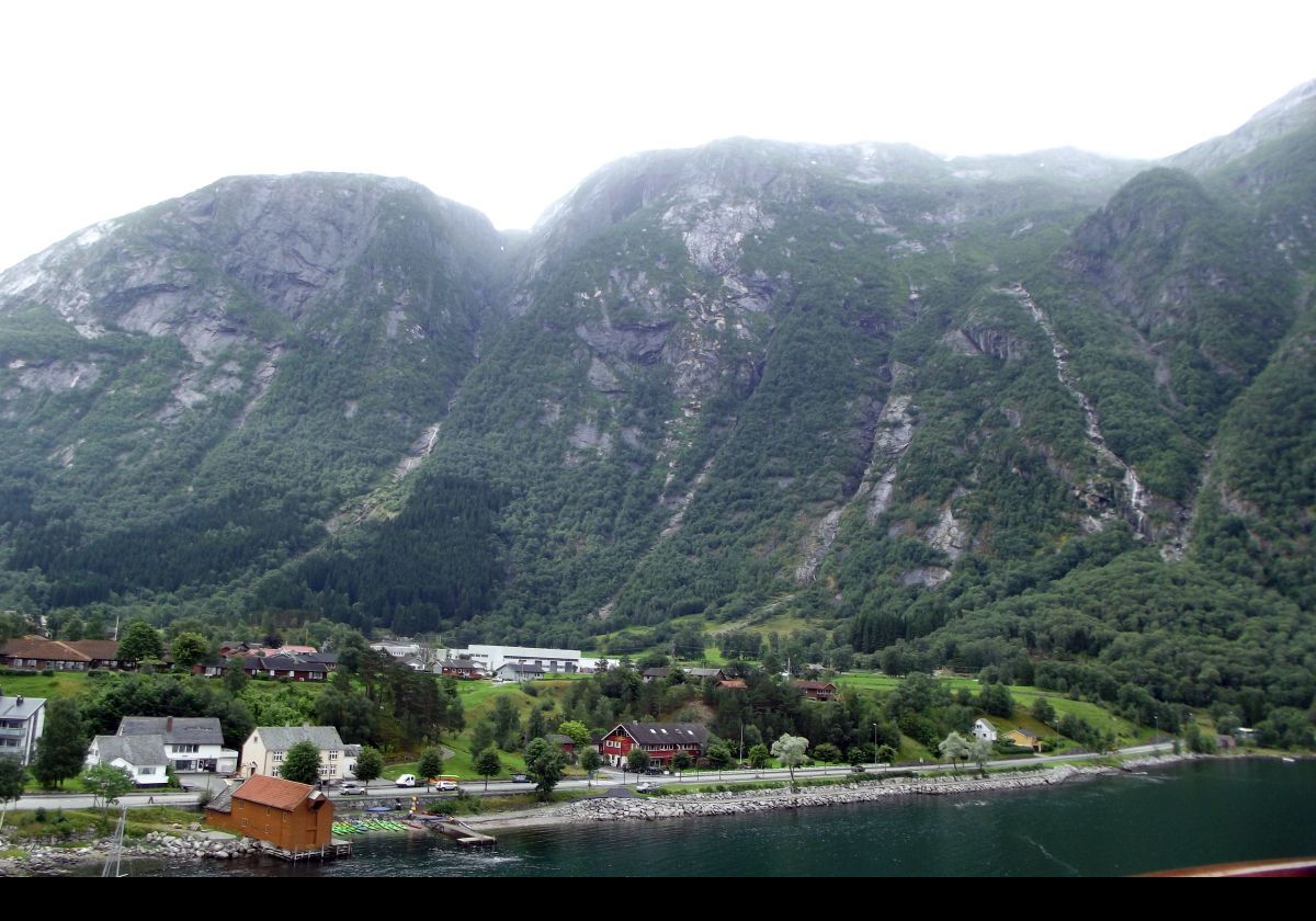 The town has mountains on two sides, the Hardangerfjord to the north-west and Eidfjordvatnet, or Lake Eidfjord, to the south-east. At 179 kilometres long, or about 112 miles, the Hardangerfjord is the fourth longest fjord in the world.