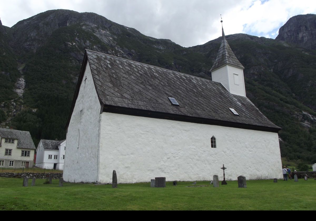 The north wall of the Lutheran Old Eidfjord Church (Eidfjord gamle kyrkje) on the outskirts of Eidfjord. Built around 1309, it was in regular use up until 1981 when the new Church was built.