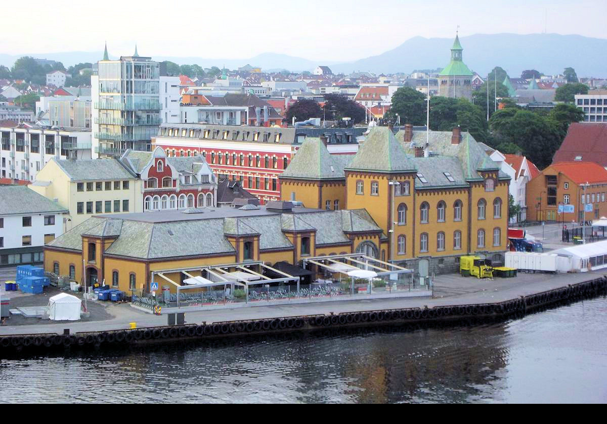 On the left of this building on the waterfront is Sumo Restaurant Hall Toll, a well known restaurant.  The Valberg tower, with its green roof, is visible to the right.