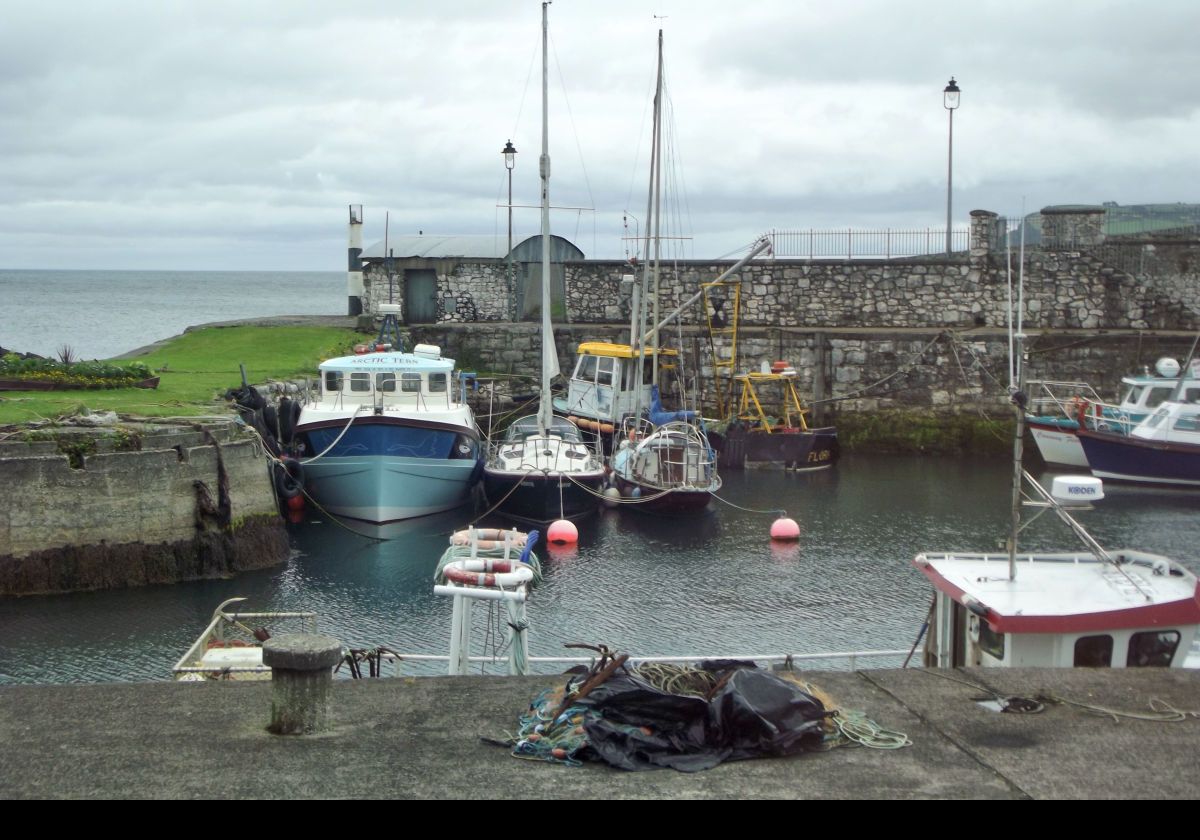 Some pictures of Carnlough Harbor in the village of Carnlough in county Antrim. The harbor is used for pleasure boats and small fishing boats.