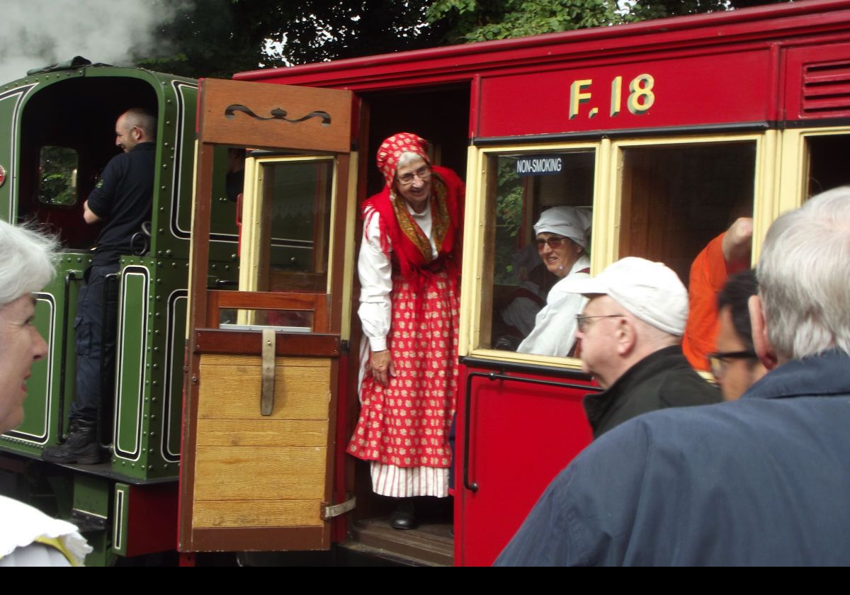 Arriving in Castletown to be greeted by a small group in traditional dress.