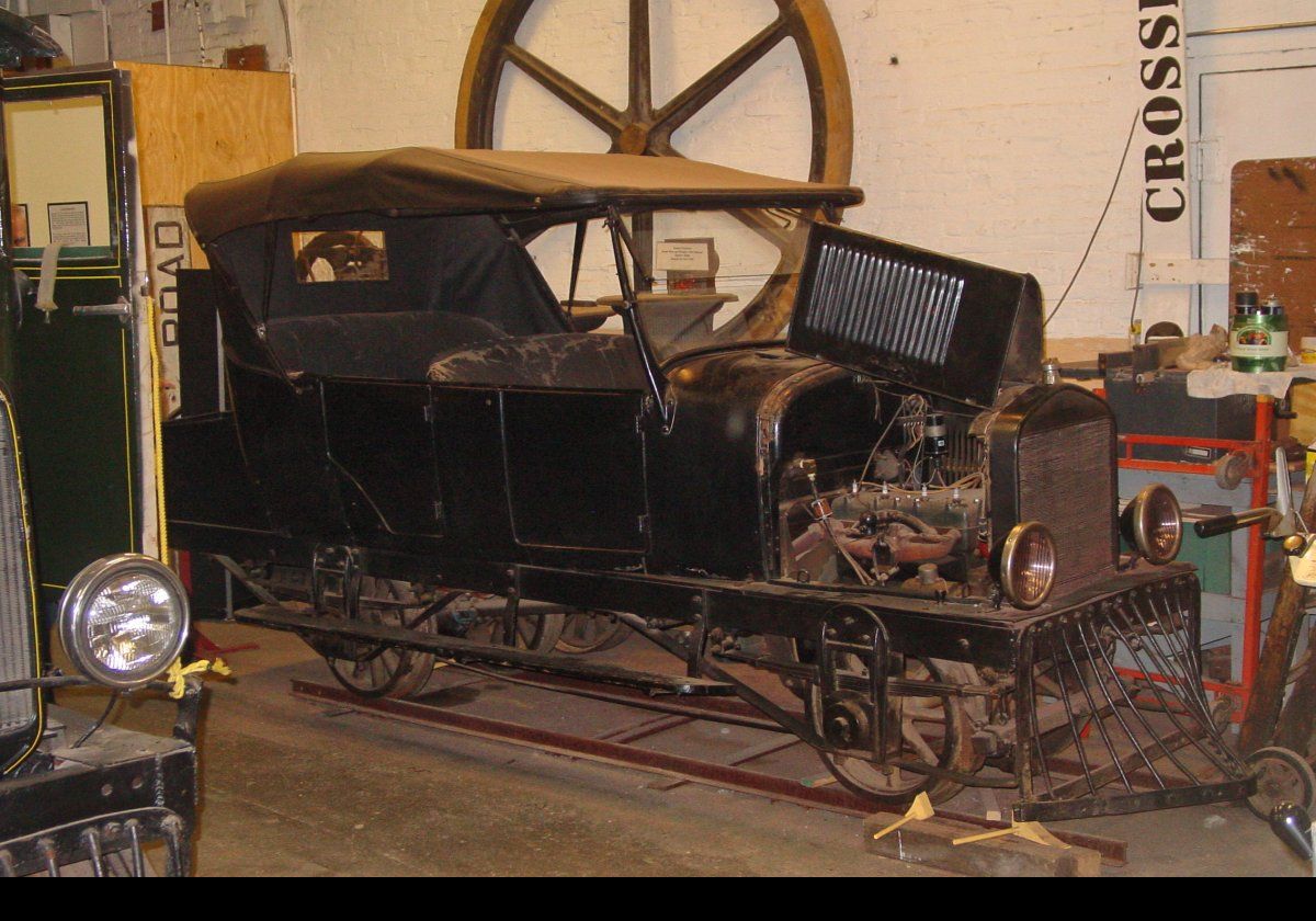 The next few pictures show the interior of the museum with vintage stock from various two foot narrow gauge railways in Maine.  There are two specialized engines; the larger being for passengers, while the smaller is an inspection vehicle.  Both derive from converted Model "T" Fords.  