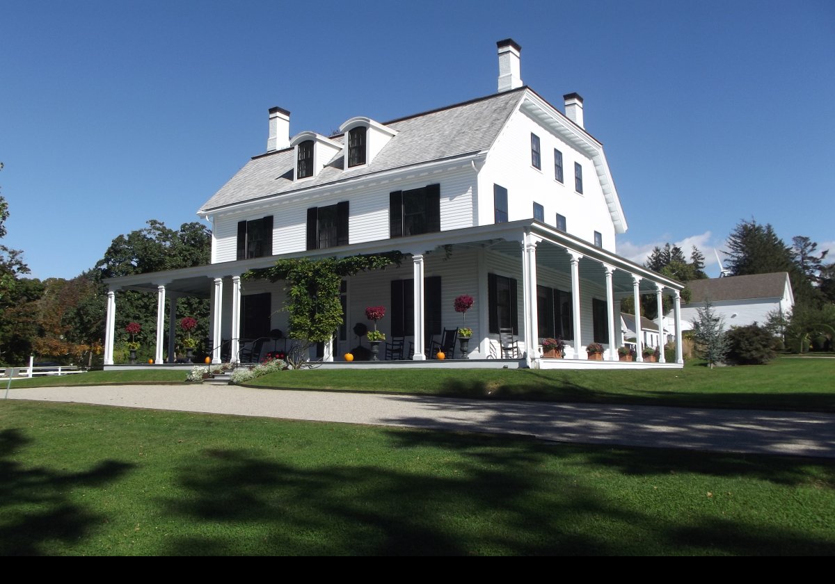 Thomas E. Brayton purchased this seven acre estate in 1872.  At that time, the white clapboard house had been built and it was run as a small farm.  
