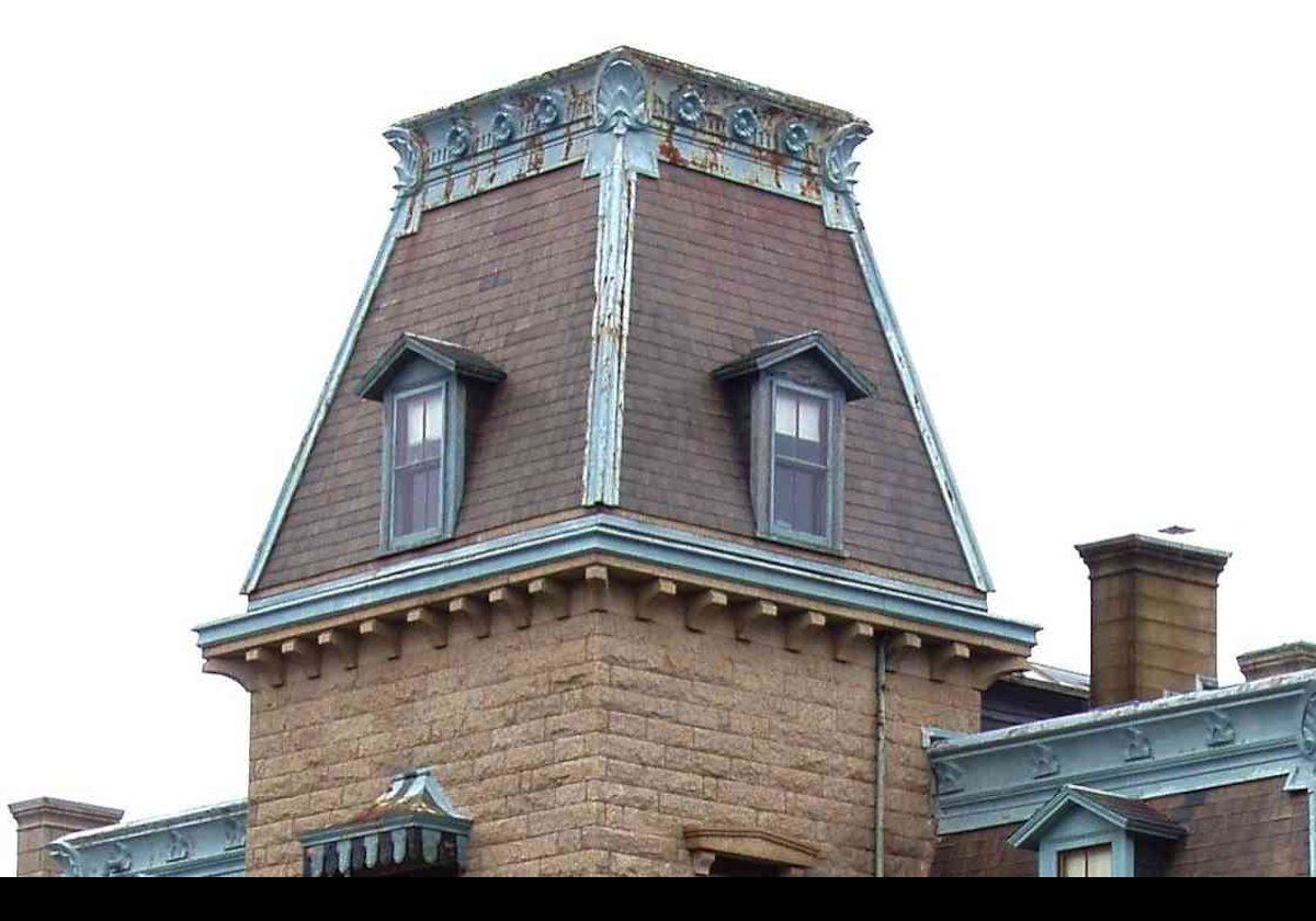 The tower, along with much of the exterior and roof, recently underwent renovation. This picture shows the tower before restoration.