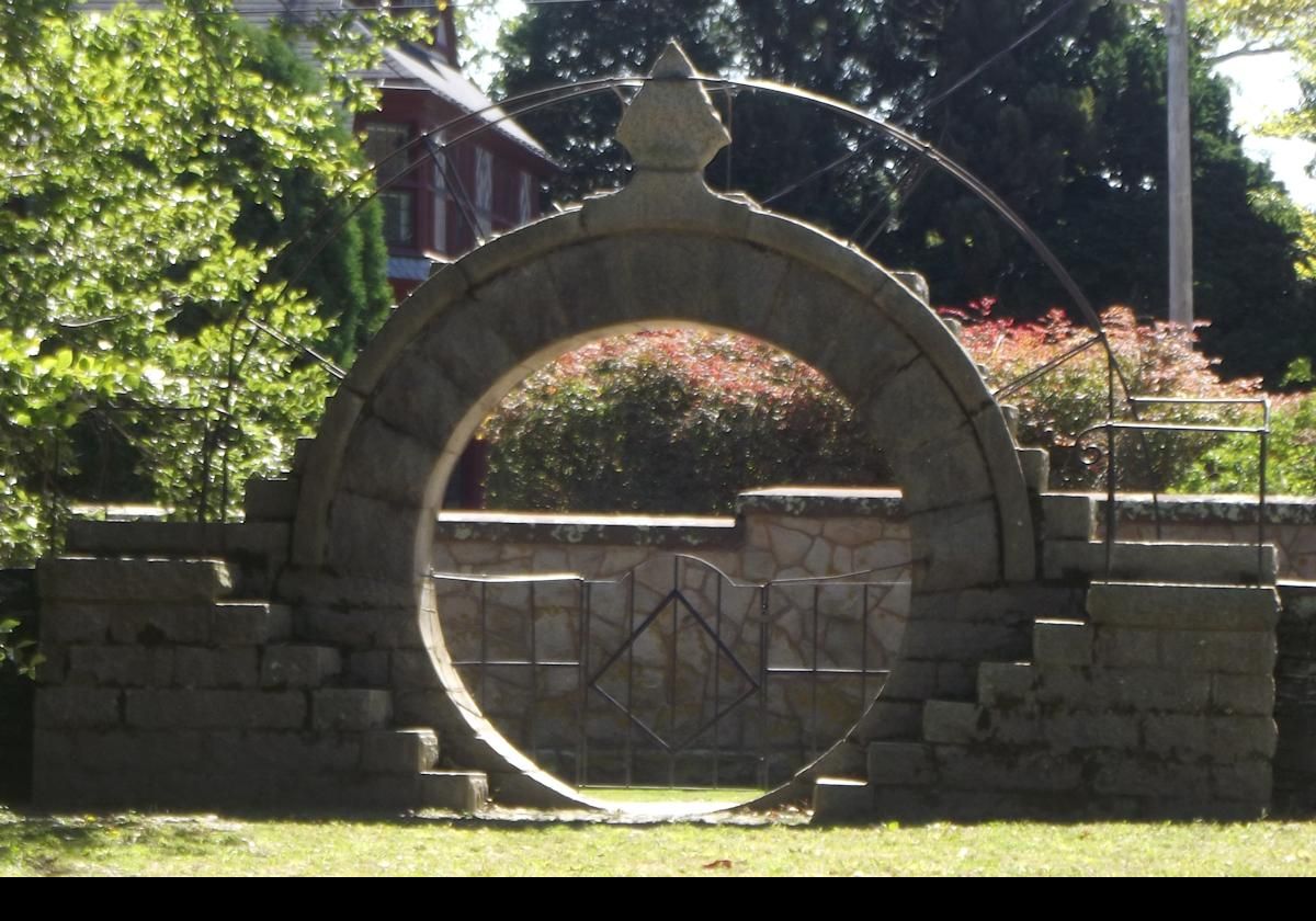 This is the Moon Gate with the Monkey Seat on top; so called as they would often chain a monkey to the seat at the top so that when a visitor arrived, the monkey would make a noise indicating their arrival. Rather cruel, and not terribly politically correct!