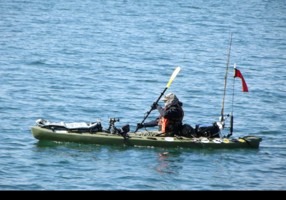 An intrepid fisherman out on the bay.