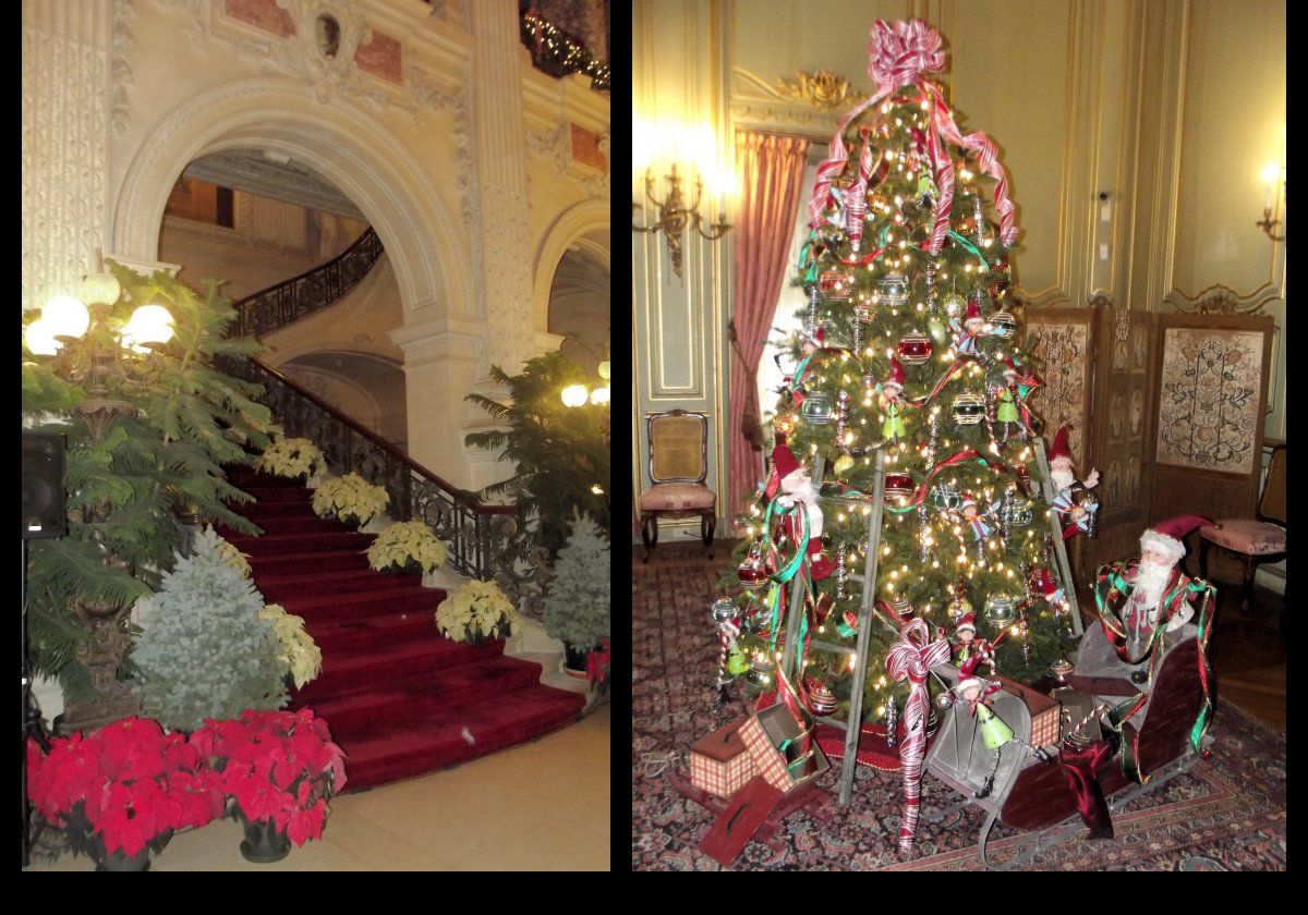 To the left is a part of the Grand Staircase; while on the right is one of the traditional Christmas trees on display.