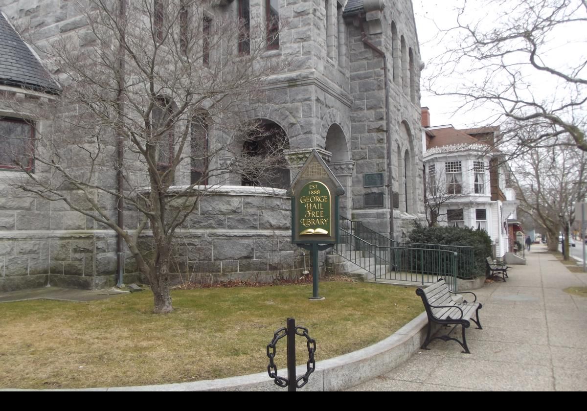 We can never resist a library, and this is the George Hail Public Library. The library first opened in a building on Main Street in 1871. It moved to the Cyrus Peabody building in 1876.