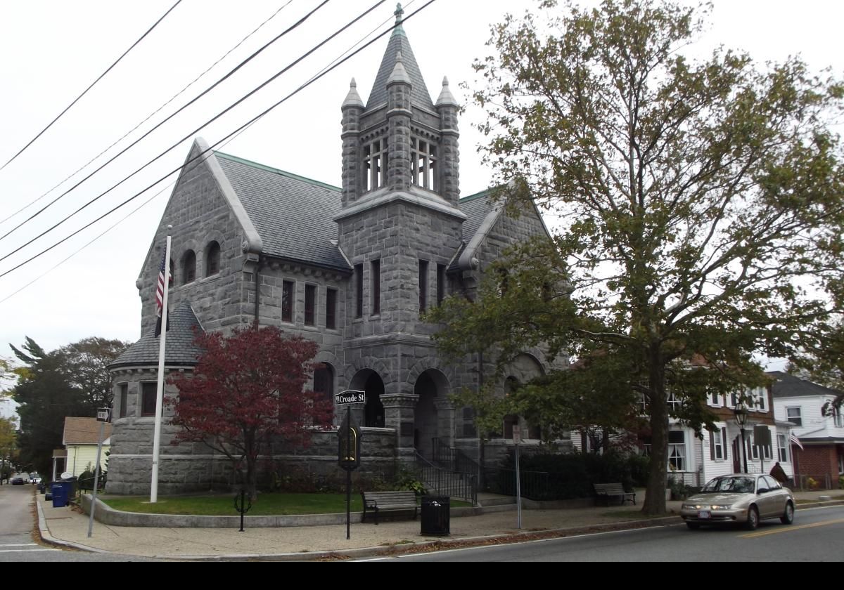 Martha Hail made a substantial contribution to the library in 1882 to commemorate her husband George; hence the George Hail Library.  Construction of the current Romanesque Revival building was completed in 1889 in granite.