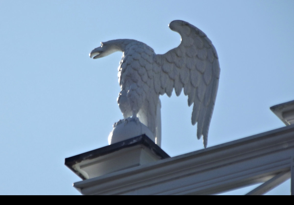 The four eagles were carved by sailors on board the “Yankee” during the War of 1812 and given to Benjamin Churchill, who was their Captain. He had purchased the house in 1822.