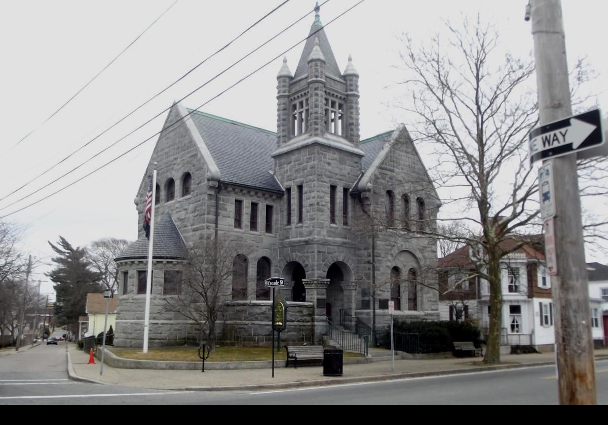Construction of the current Romanesque Revival building was completed in 1889 in granite.  