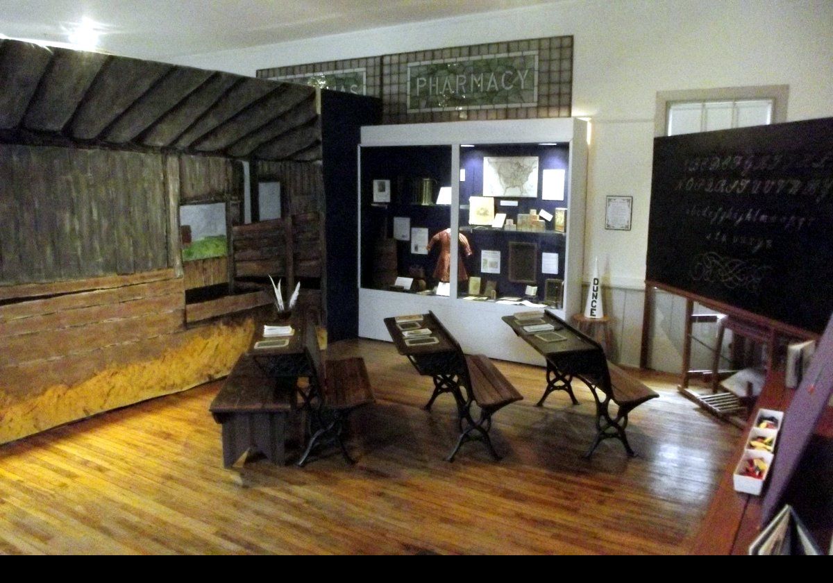 A recreation of a historical school room. Not so much different from when I was in school in the 1950s & 60s! Note the interior shots are hand-held without the benefit of flash .