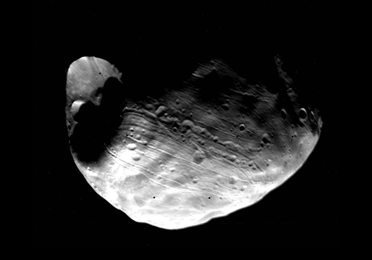Stickney Crater on Phobos taken by Viking 1 Orbiter in 1977.  It is about 9 km (5.6 mi) in diameter.  