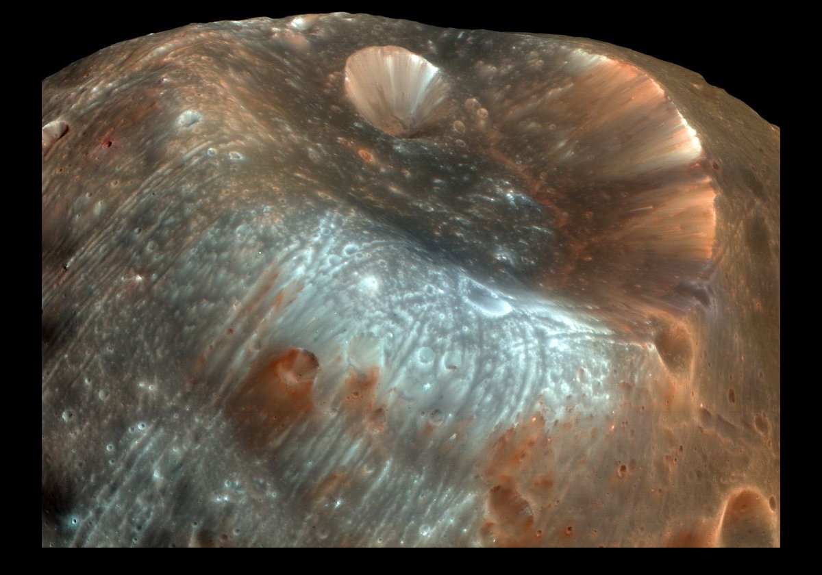 Stickney Crater on Phobos taken by the Mars Reconnaissance Orbiter in 2008.  The small crater inside Stickney is called Limtoc, a character in Gulliver's Travels I believe.  It is about 2 km (1.25 miles) across.   