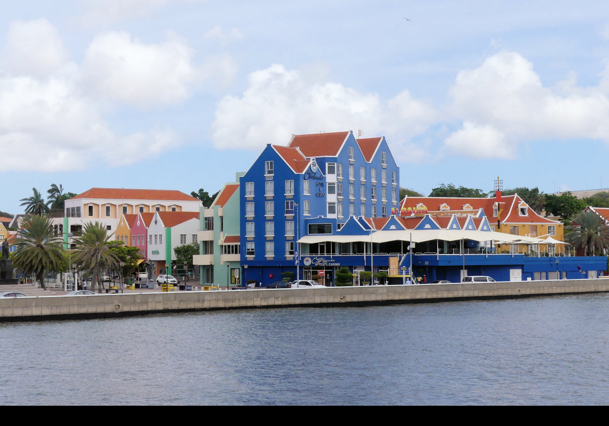 Brightly colored building fronting Saint Anna Bay.