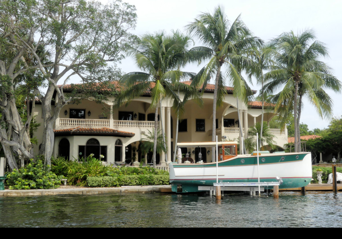 Comparatively modest house (!) and a wonderful looking boat.